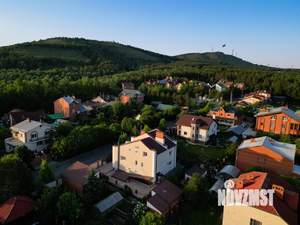 Коттедж 350м², 4-этажный, участок 10 сот.  