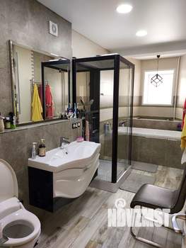 Коттедж 410м², 3-этажный, участок 13 сот.  